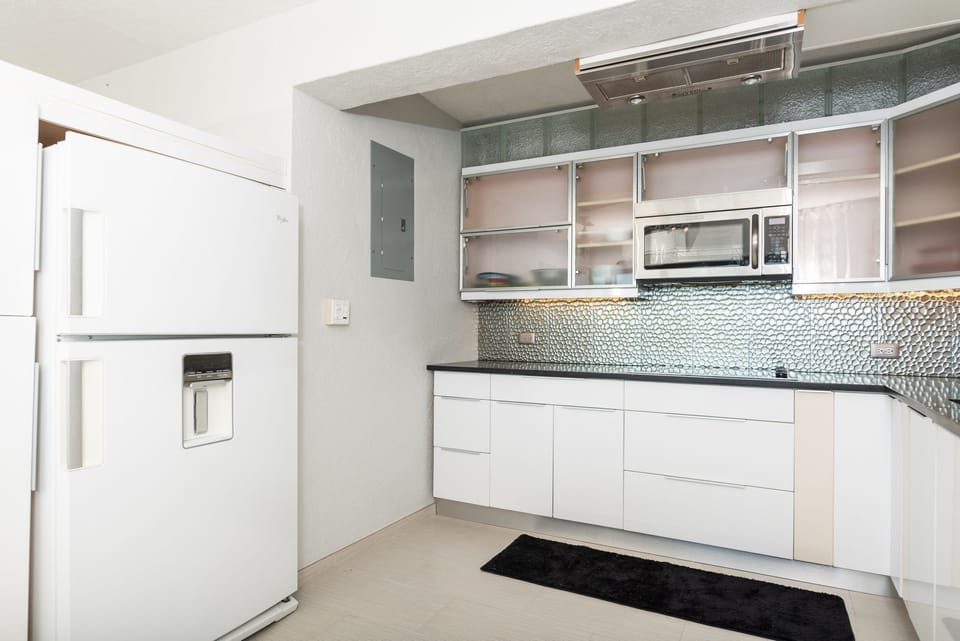 Kitchen has everything you'll need to prepare your vacation