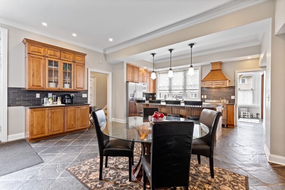 Eat-in kitchen with seating at the bar and table