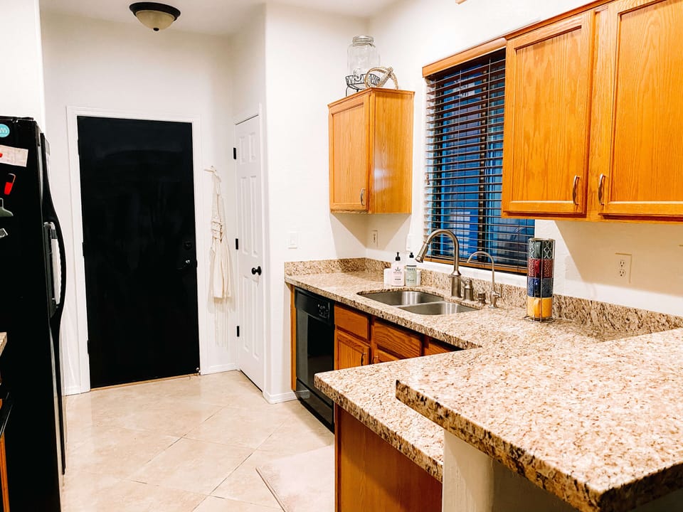 Garage entrance, pantry and breakfast bar