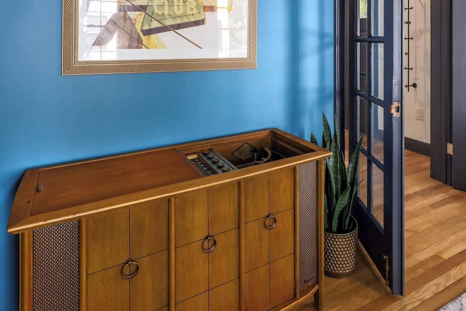 Enjoy a cocktail in the chic 'record room'