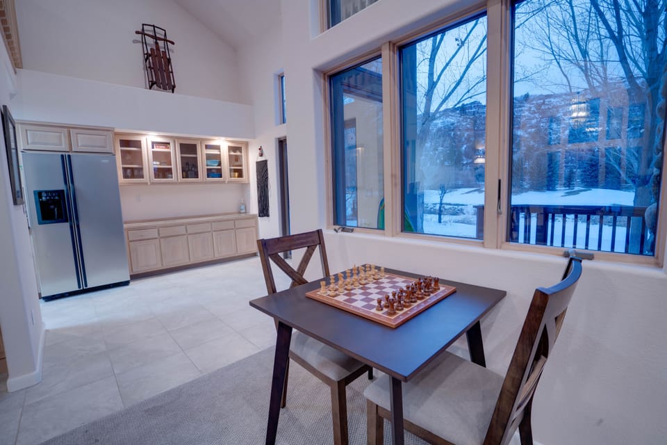 Unwind with a game of chess and take in peaceful mountain and golf course views.