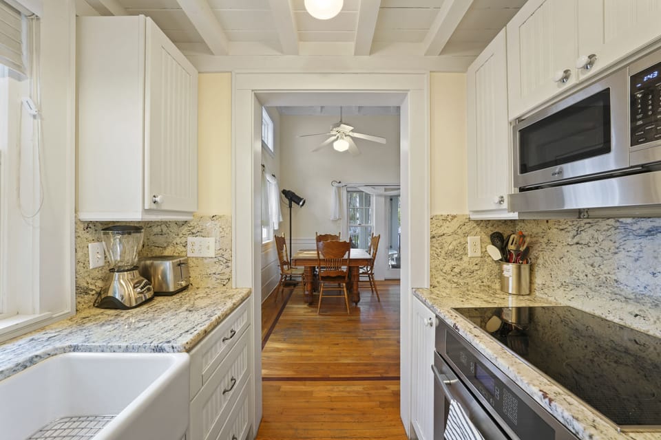 KITCHEN FEATURING ALL NECESSARY APPLIANCES