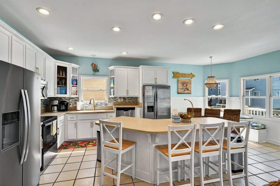 Kitchen with 2 refrigerators, drip & Keurig coffee makers, & fully stocked