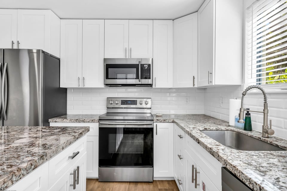 Kitchen amenities include Keurig, electric kettle, blender, toaster, and more