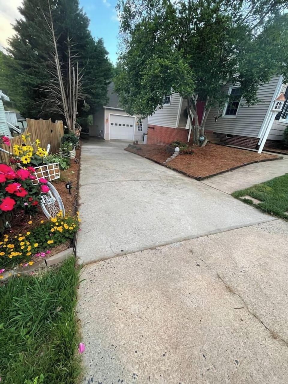 Just walk down our driveway and the entrance is to your right under the new deck. 