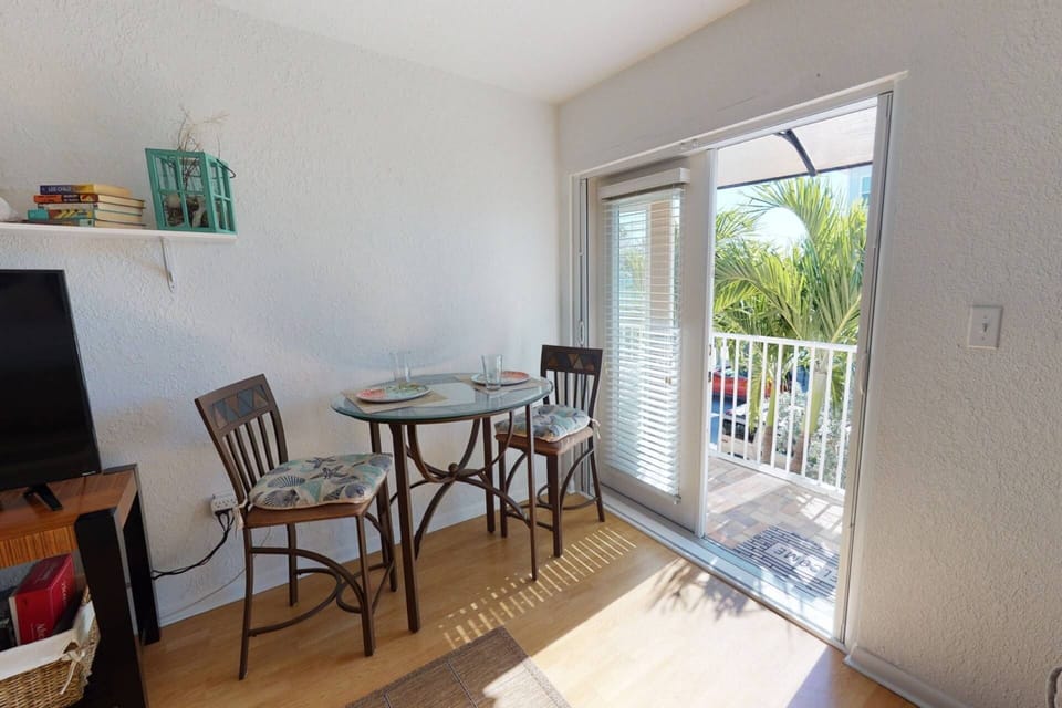 Have a snack or meal by the balcony overlooking tropical plants