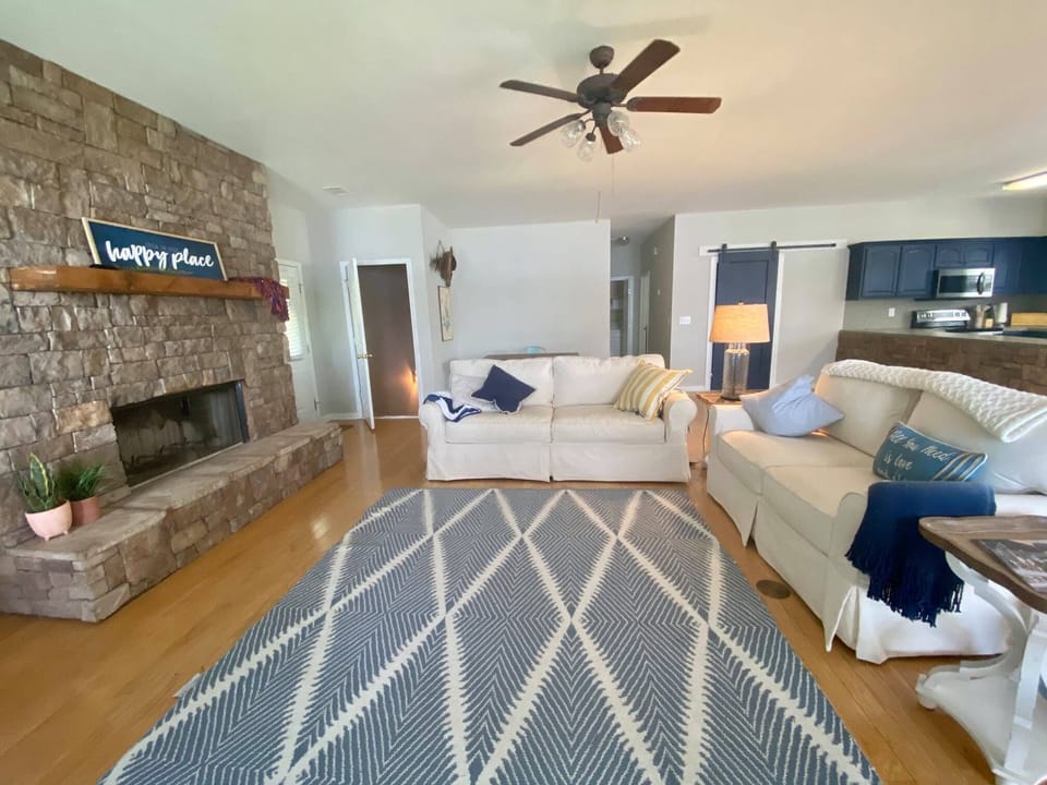 Living room w/wood burning fireplace