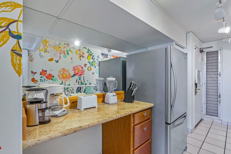 Stocked kitchen with basic amenities for cooking.