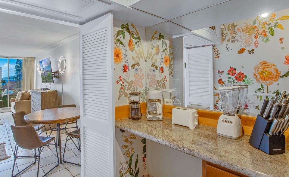 Stocked kitchen with basic amenities for cooking.