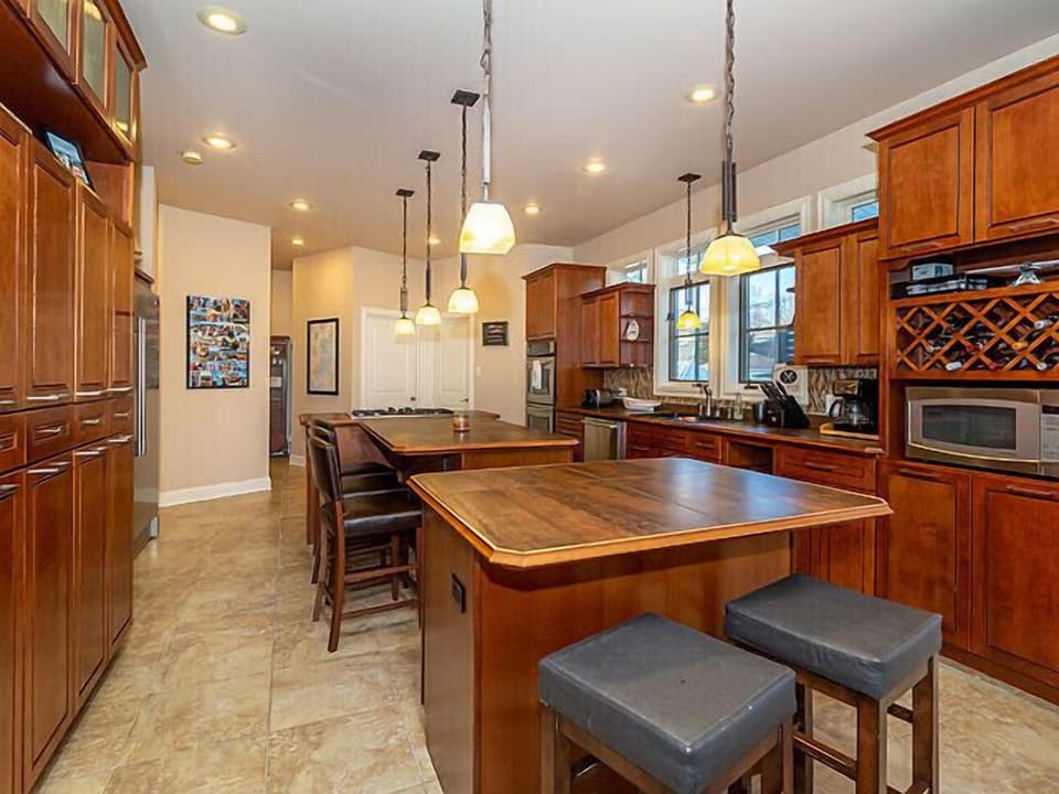 2 islands both with seating. 