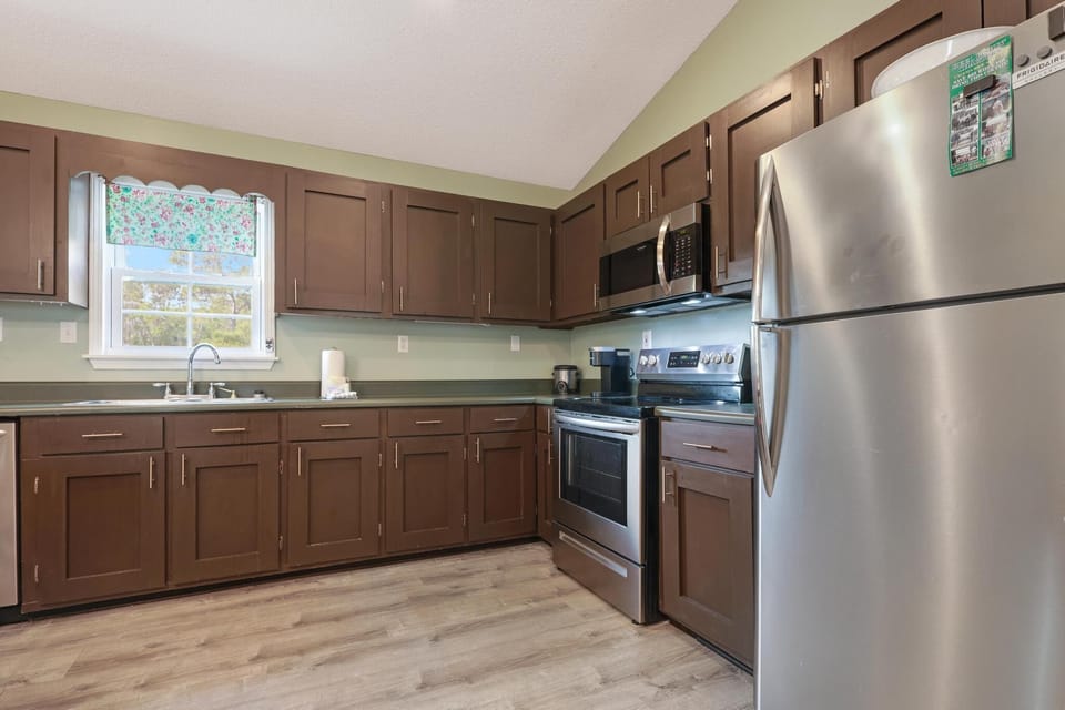Kitchen - Each cabinet and drawer is fully stocked with all items needed for meal prepping during your stay.