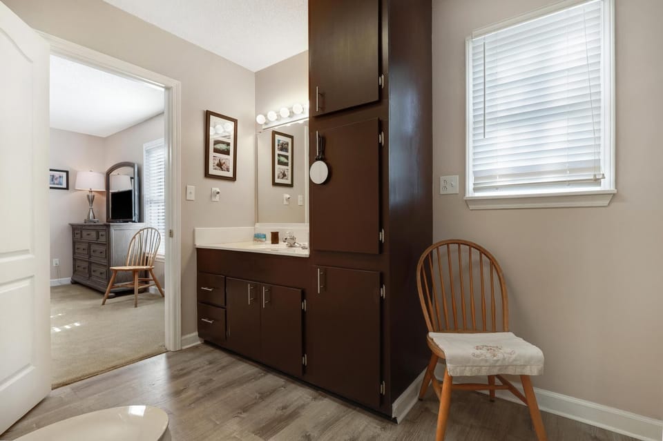 Private Bathroom - The private bathroom features a single vanity and plenty of cabinets for putting your personal belongings away during your stay.