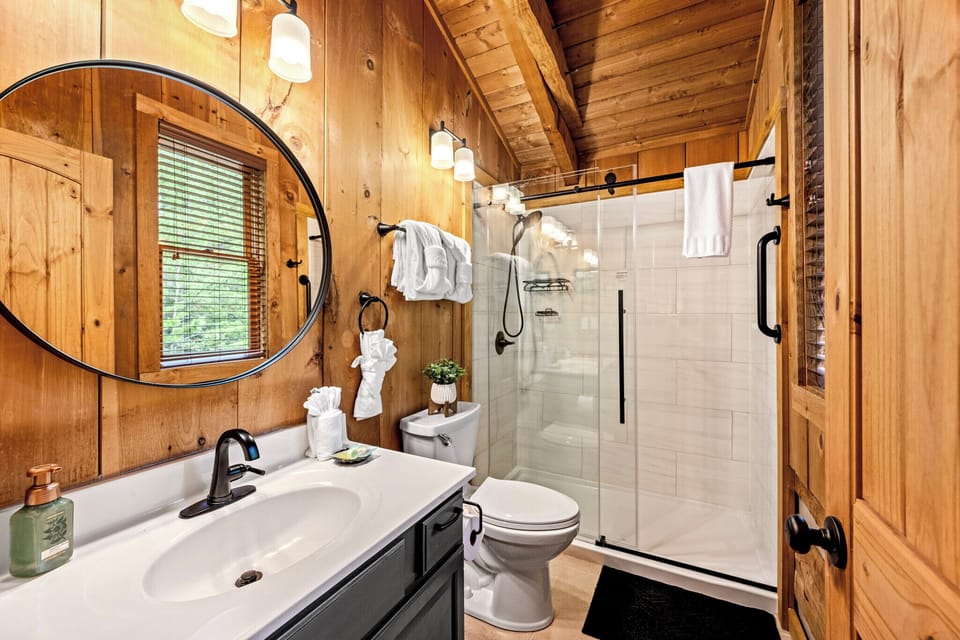 Recently renovated bathroom with tile walk-in shower 