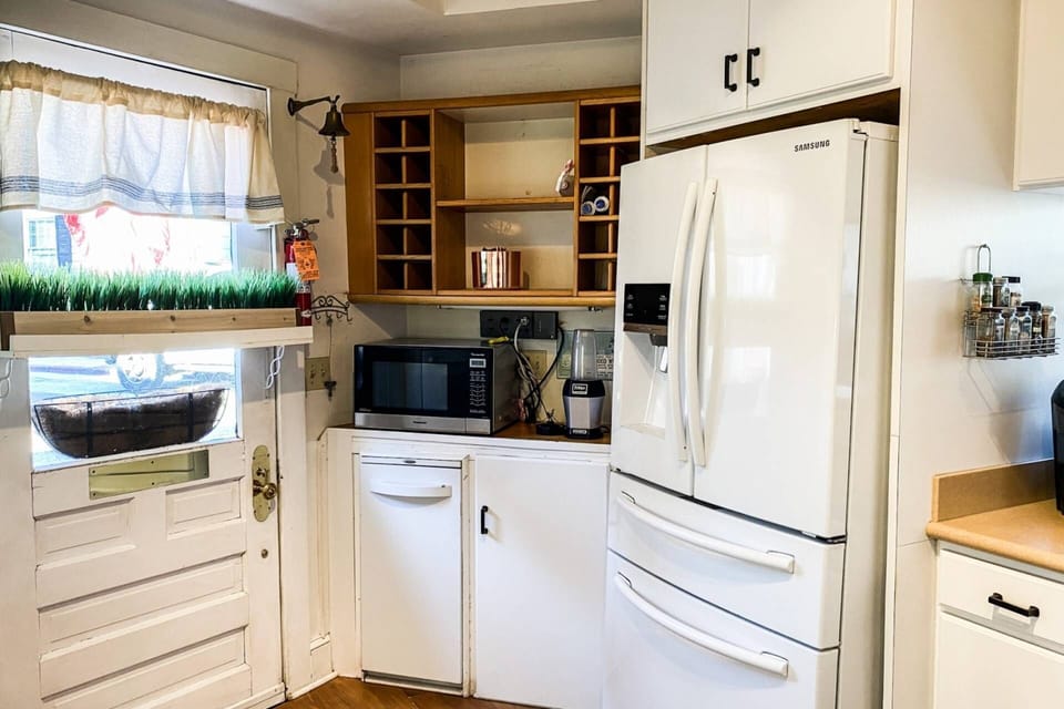 The kitchen appliances: double oven, dishwasher, microwave, ice maker - even a Ninja!