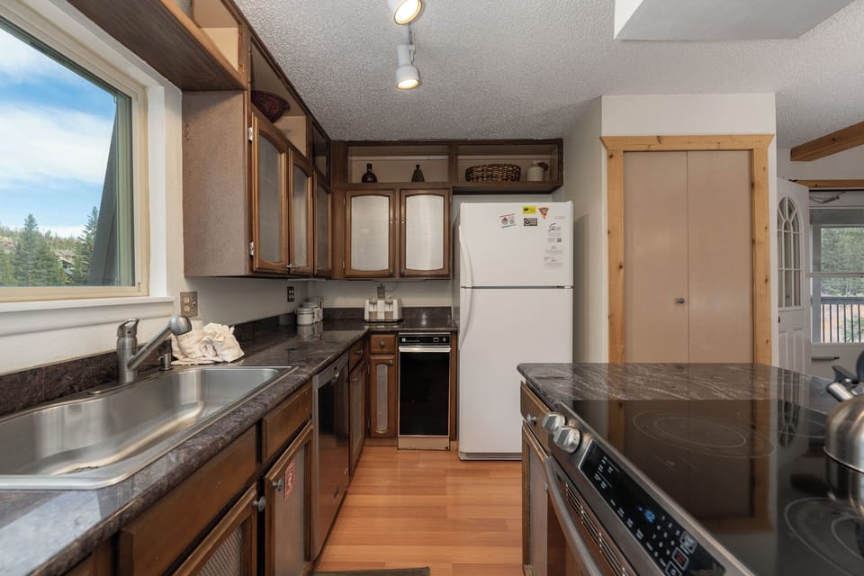 Your fully equipped kitchen features granite counters and modern appliances, perfect for creating memorable meals together.