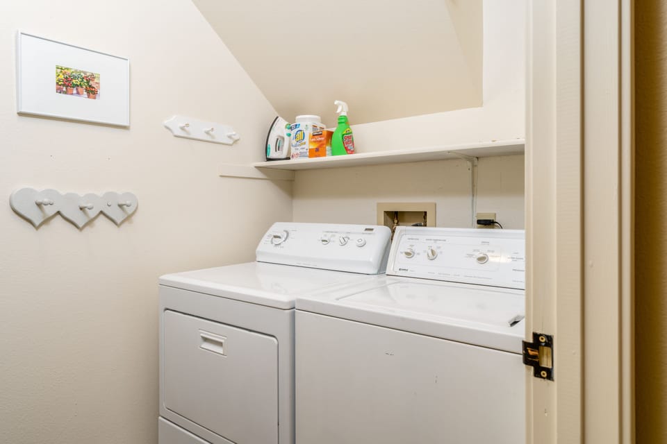 Lower Level Laundry Room with full size washer/dryer.  Laundry soap provided.