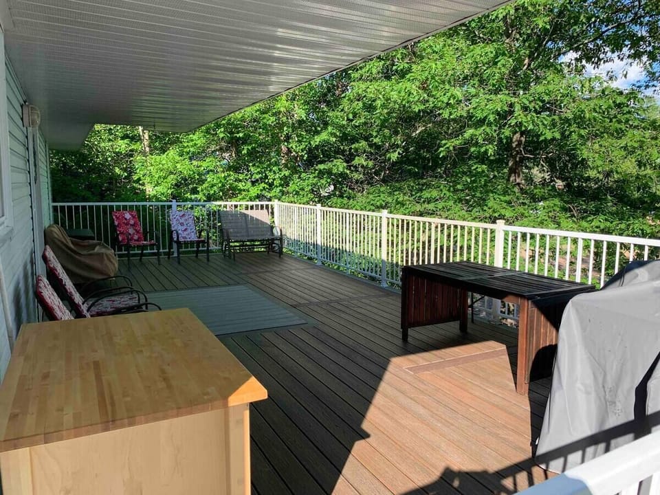 Large deck with BBQ facing the beautiful Golden Lake.