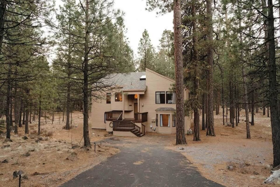 Our home is tucked away in the trees and accommodates 5 vehicles easily. 