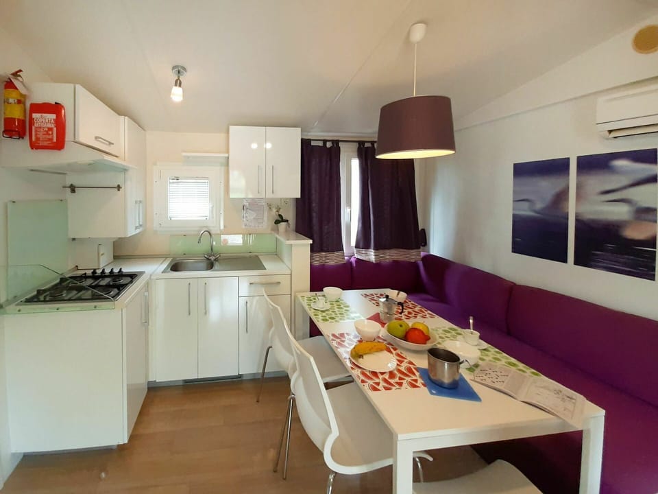 Cabinetry, Countertop, Interior Design, Table, Kitchen Appliance, Kitchen Stove, Food, Chair, Sink, Flooring