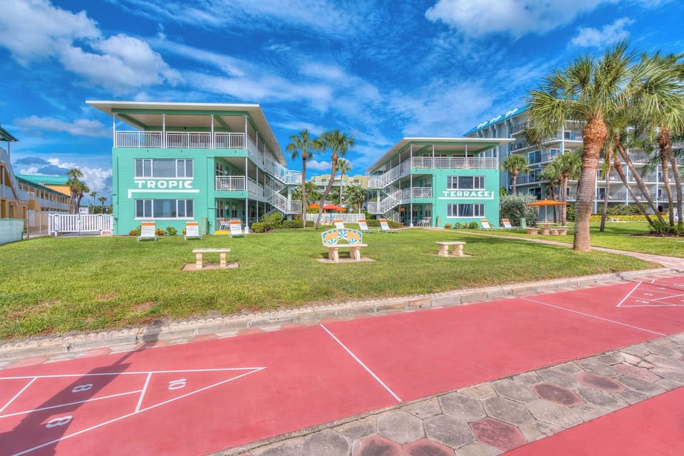 Outdoor Fun & Games include sundeck, cornhole, and shuffleboard courts