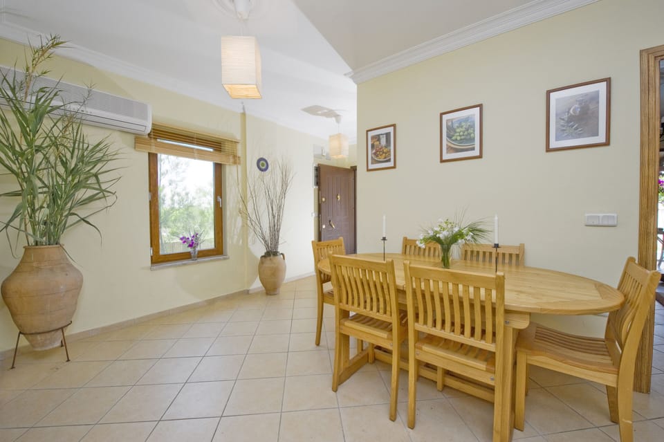 Dinning table which opens to sit 8 people a high chair for babies available