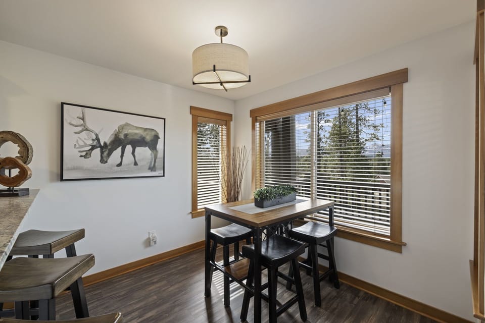 Secondary Dining Nook With Views And View To Outdoor Lounge