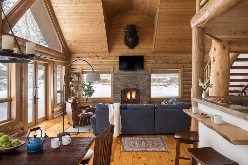 Living room with wood burning fireplace