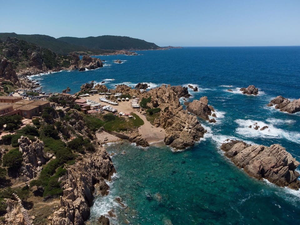 Water, Sky, Water Resources, Azure, Natural Landscape, Mountain, Vegetation, Coastal And Oceanic Landforms, Terrain, Landscape