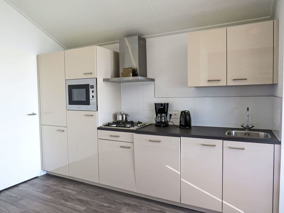 Cabinetry, Property, Countertop, Building, Sink, Kitchen Sink, Kitchen Stove, Kitchen, Kitchen Appliance, Tap