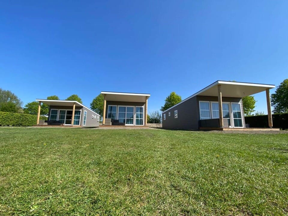 Sky, Plant, Building, Property, Tree, House, Land Lot, Natural Landscape, Grass, Real Estate