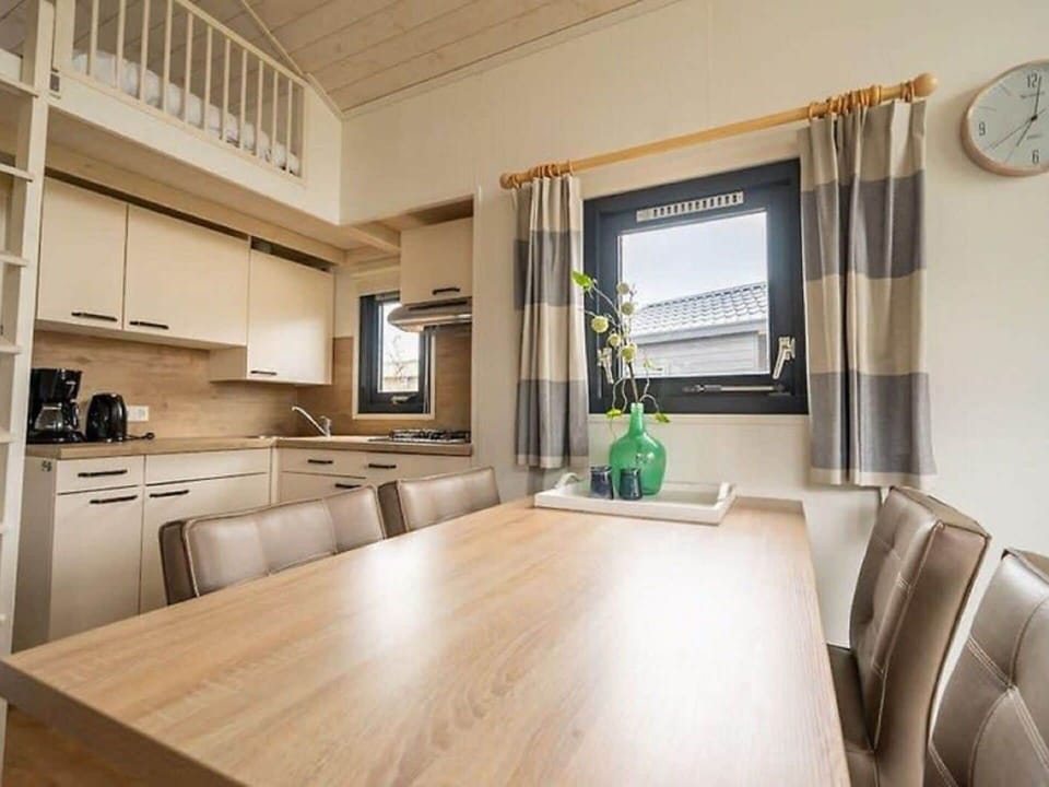 Furniture, Table, Chair, Interior Design, Countertop, Clock, Wood, Flooring, Cabinetry, Real Estate