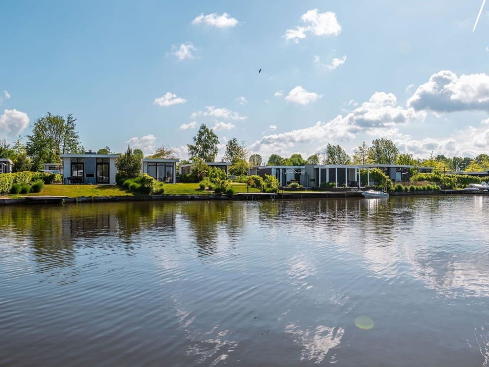 Cloud, Water, Sky, Plant, Natural Landscape, Tree, Lake, Building, Landscape, City