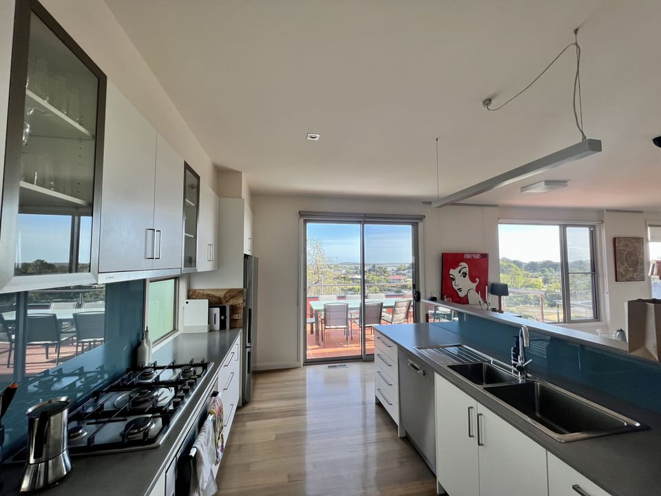 Kitchen with stocked pantry and appliances
