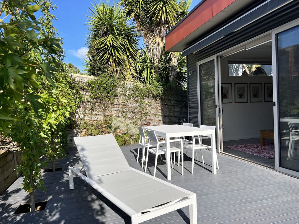 Rear deck with outdoor furniture