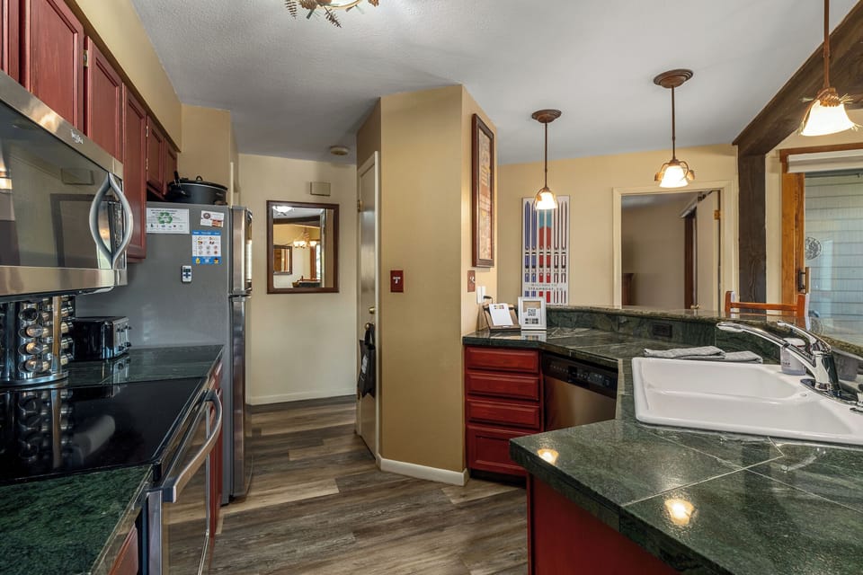 Spacious kitchen with granite countertops