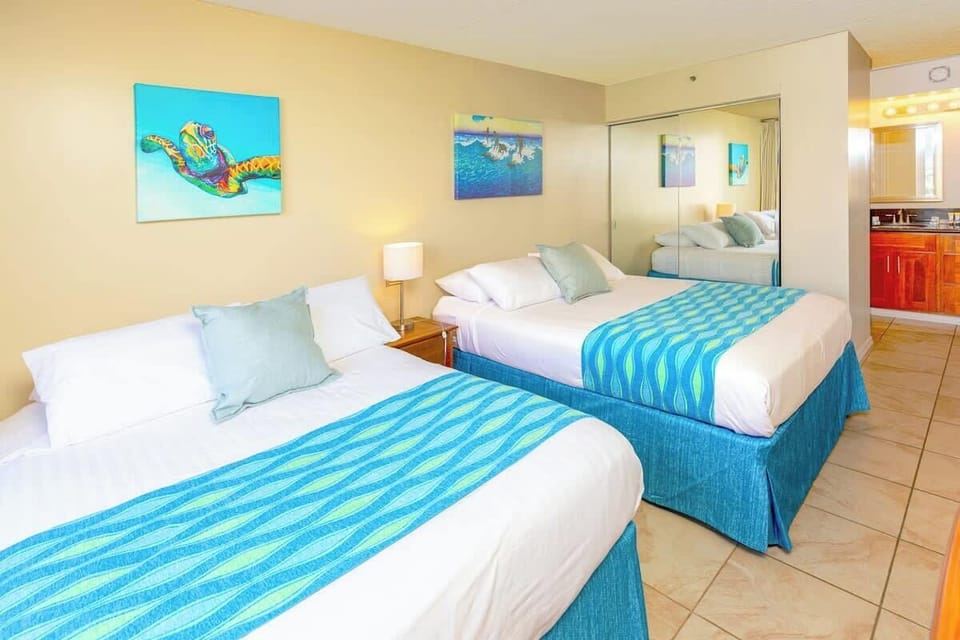 Bedroom with cable TV and sliding door that can be closed for privacy