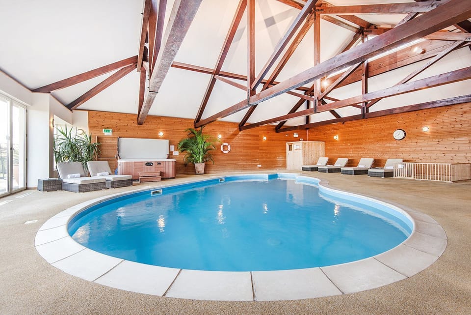 Clydey heated pool area with baby safety pen