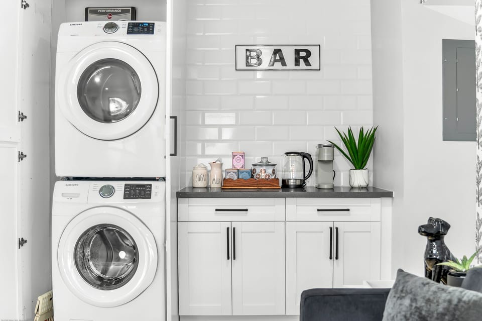 Full sized washer and dryer, and coffee and tea bar
