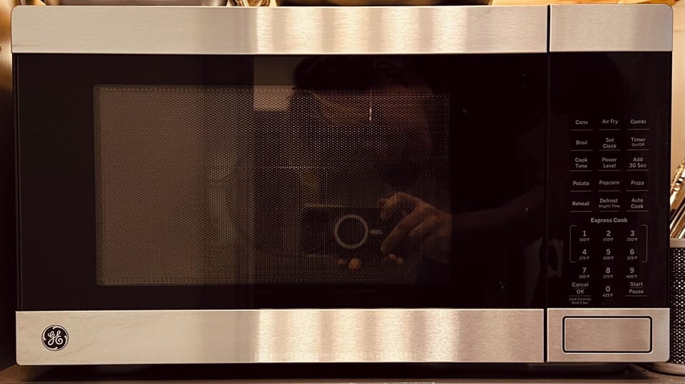 Sleek microwave convection oven for efficient heating, baking, and roasting