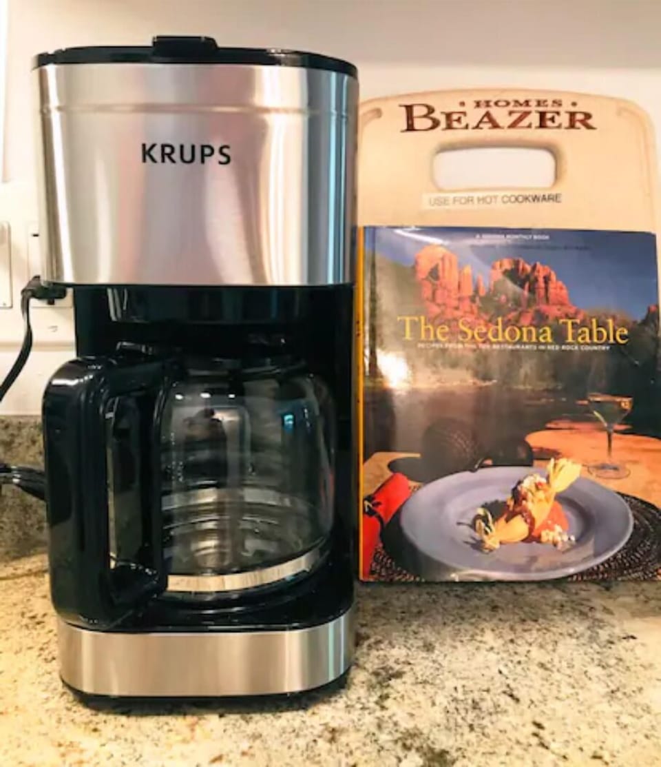 Enjoy a 12-cup coffee maker and Sedona cookbook in this well-stocked kitchen
