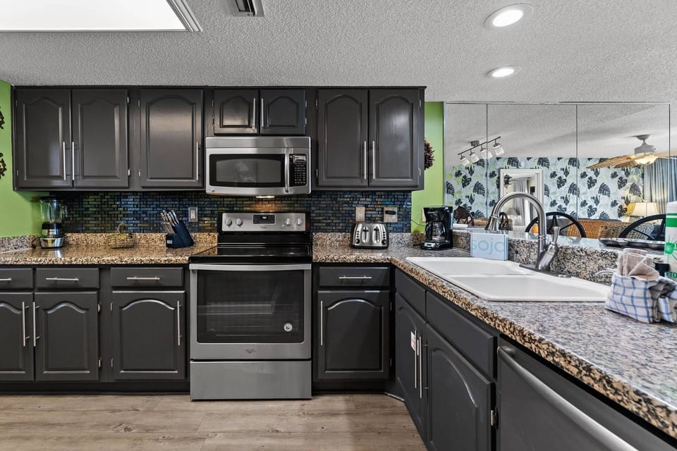 Cook your own meals in this modern kitchen.