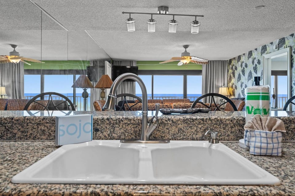 Large double sink for dishes and washing produce.