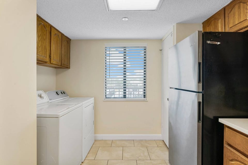 Laundry Area with full size washer and dryer are a must-have feature for a family