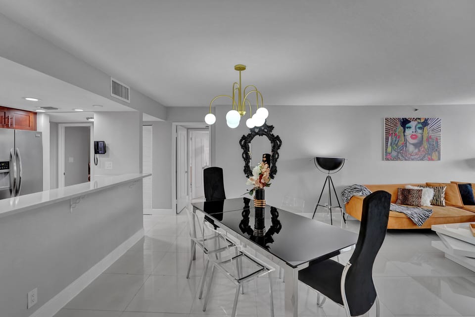 Dining area for 6, living room, Roku tv, Balcony access, fully equipped kitchen