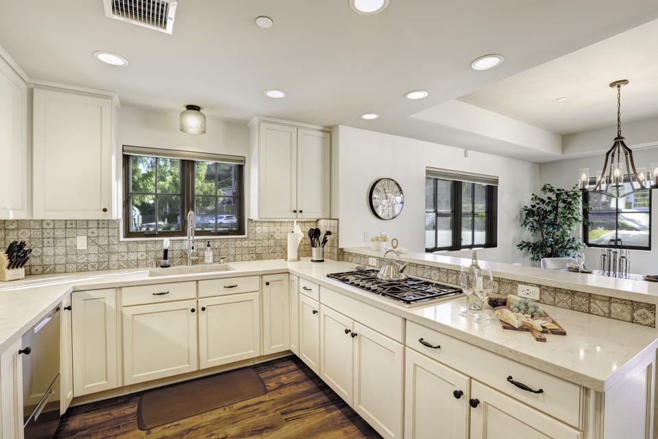 Hardwood floors, quartz countertops, and brisk sea breeze here.