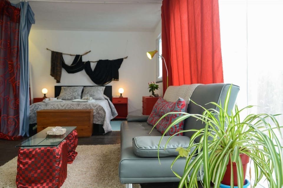 Open plan suite includes living area.