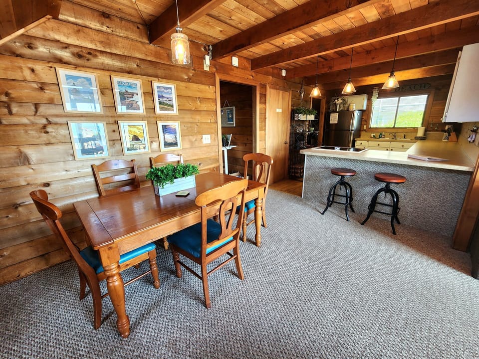 Dining Area, Bar Seating and Kitchen