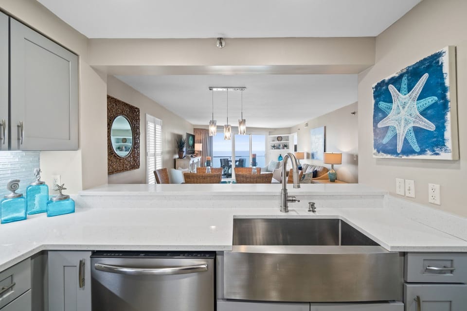 Imagine preparing a meal and viewing the Gulf at the same time!

Professionally Managed by
Breathe Easy Rentals