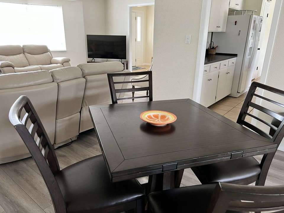 Smaller dining table with fold out leaves.