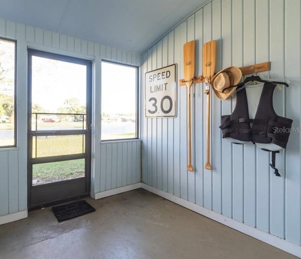 Screened porch leading to the back yard.